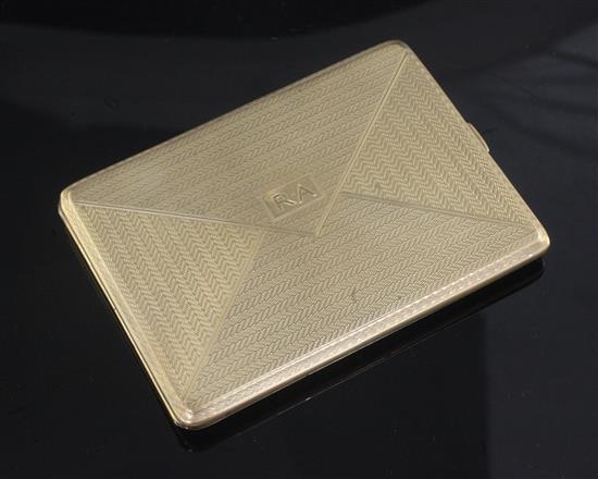 A 1920s engine turned 9ct. gold envelope cigarette case, 11.5cm.